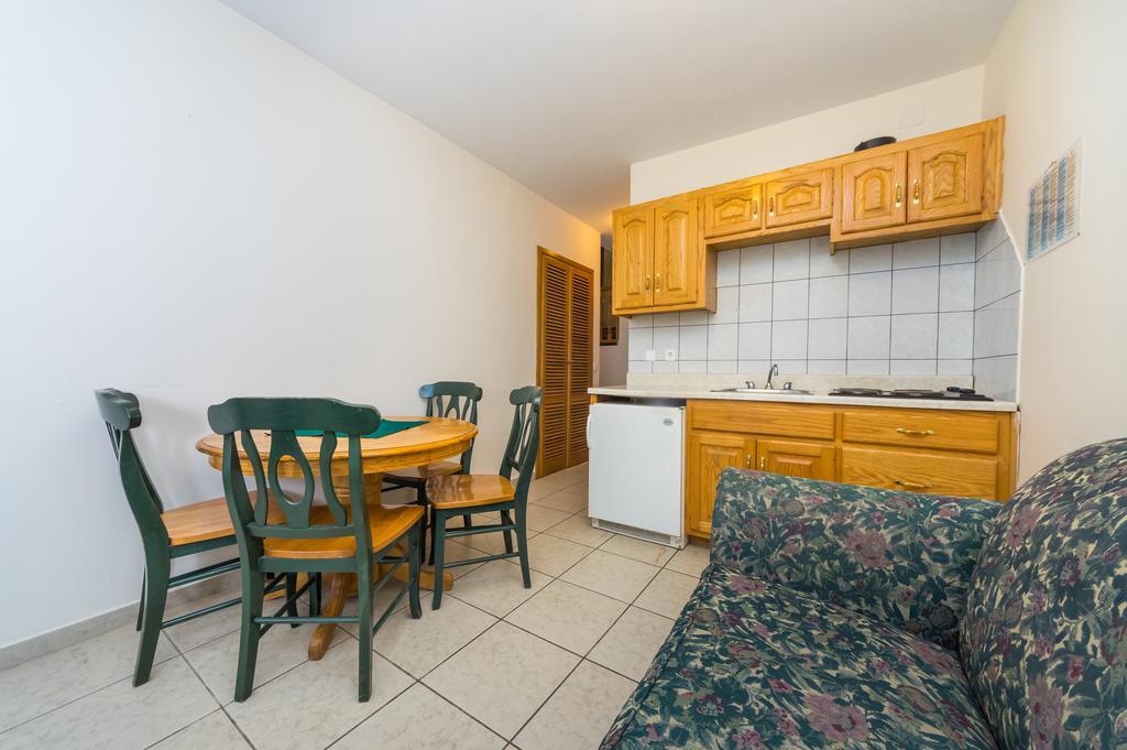 Guest House Golden Shell 1 ムルテル 部屋 写真